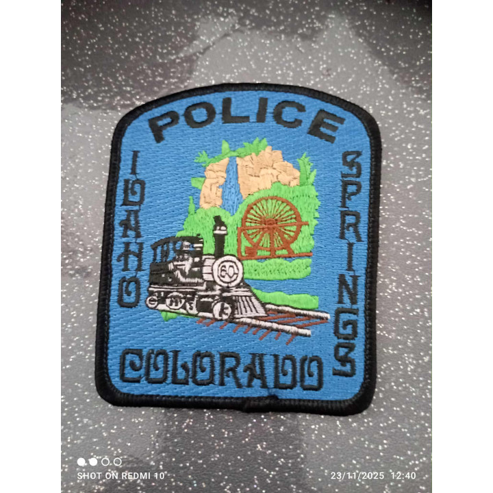 ECUSSON POLICE AMERCAINE IOHAO SPRINGS COLORADO